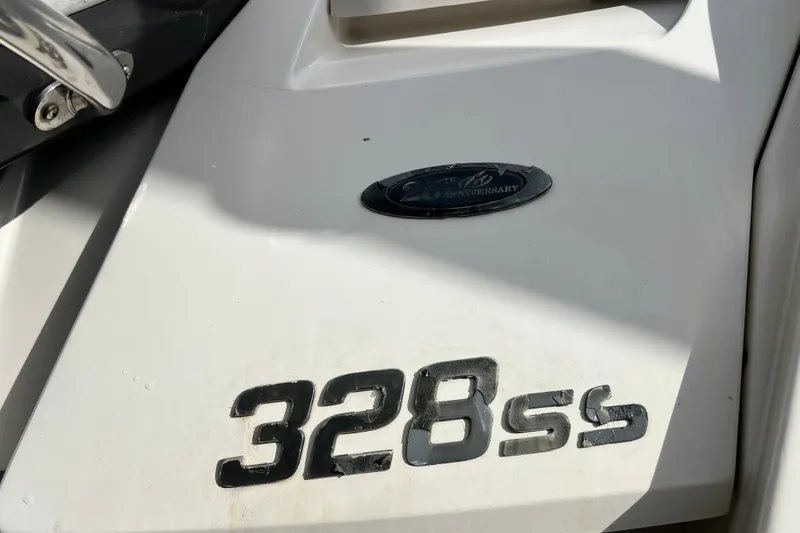 Slide: The Image of Close-up of 2011 Monterey 328SS Super Sport boat emblem and model number. - 21