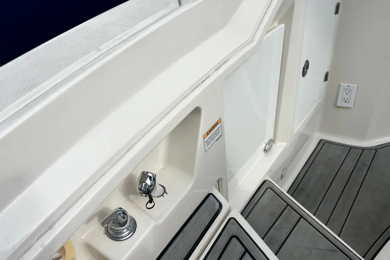Slide: The Image of Interior view of a 2011 Monterey 328SS Super Sport boat, featuring sleek design elements. - 25
