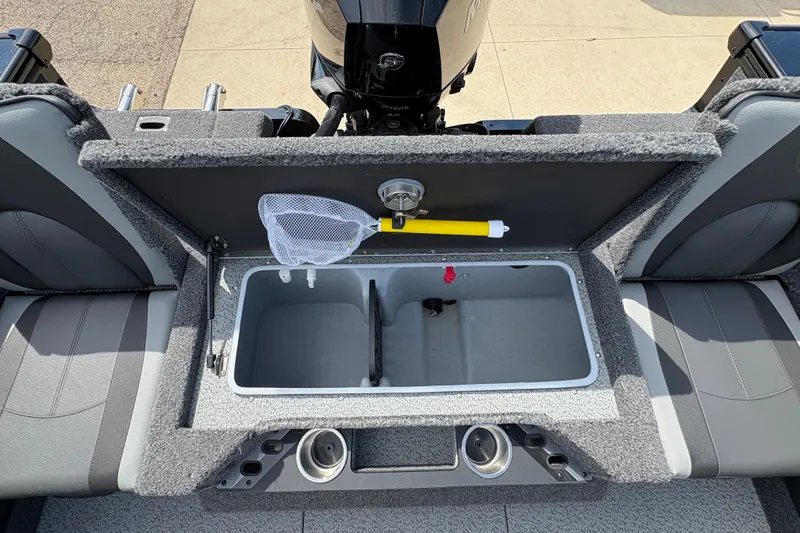 Slide: The Image of 2025 Lund 1875 Pro-V boat interior with livewell and fishing net. - 39