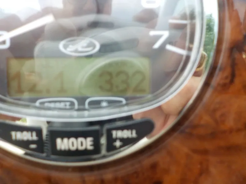 Slide: The Image of Close-up of a boat dashboard with digital displays and controls. - 17