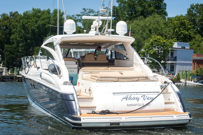 Slide: The Image of 2008 Princess V58 yacht cruising on a scenic waterway near Annapolis, Maryland. - 3