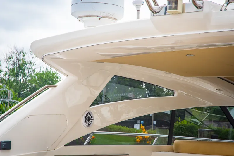 Slide: The Image of 2008 Princess V58 yacht with sleek design and modern features. - 9