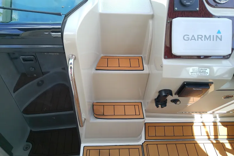 Slide: The Image of Interior steps of a 2012 Sea Ray Sundancer 280 with Garmin navigation system. - 21