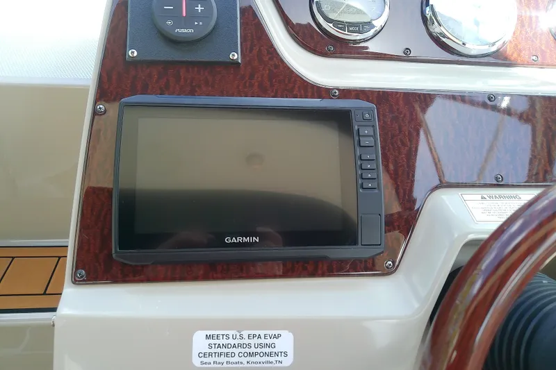 Slide: The Image of Dashboard of 2012 Sea Ray Sundancer 280 with Garmin navigation system. - 22