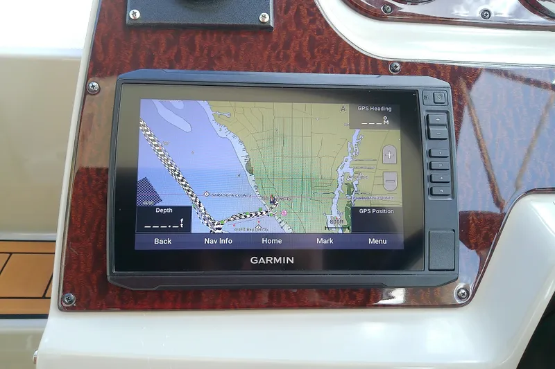 Slide: The Image of Garmin GPS navigation system on 2012 Sea Ray Sundancer 280 boat dashboard. - 25