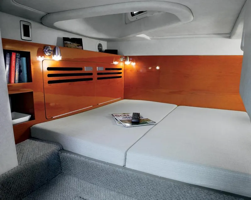 Slide: The Image of Manufacturer Provided Image: Interior cabin of 2012 Sea Ray 280 Sundancer with cozy bed and reading lights. - 65