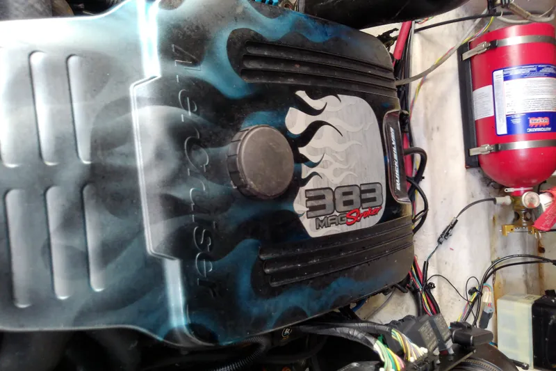 Slide: The Image of Engine compartment of a 2012 Sea Ray Sundancer 280 with 383 Mag Stroker engine. - 55