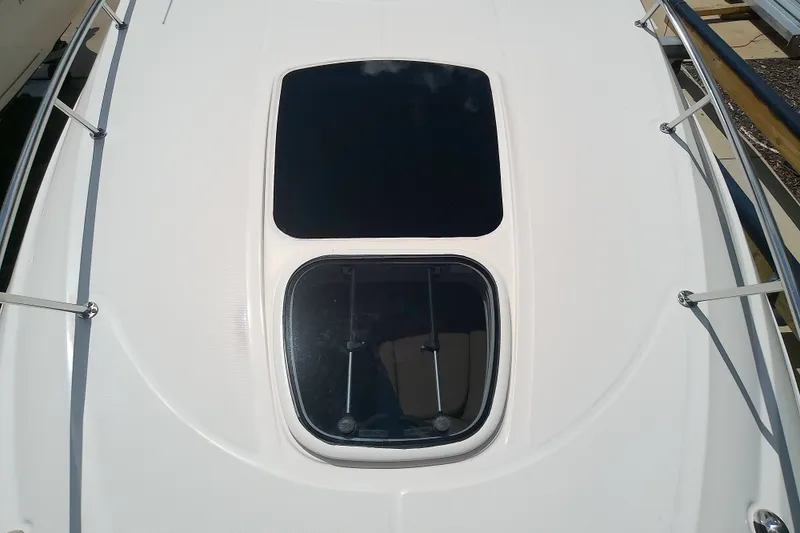 Slide: The Image of 2012 Sea Ray Sundancer 280 boat deck with hatch and railing. - 33