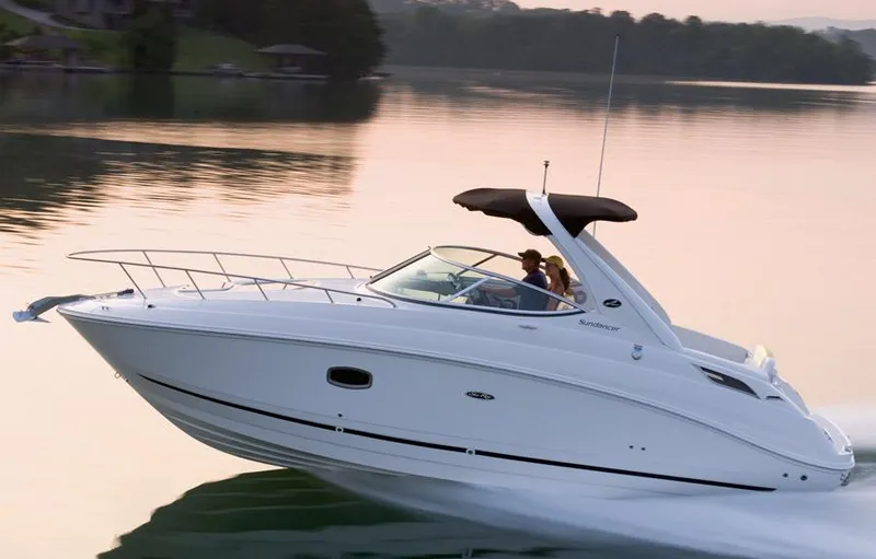 Slide: The Image of Manufacturer Provided Image: 2012 Sea Ray 280 Sundancer cruising on a calm lake at sunset. - 62