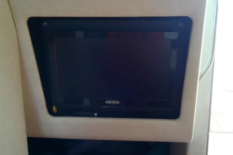 Slide: The Image of Jensen TV mounted inside 2012 Sea Ray Sundancer 280 boat interior. - 46