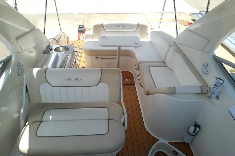 Slide: The Image of Interior of 2012 Sea Ray Sundancer 280 boat with seating and kitchenette. - 34