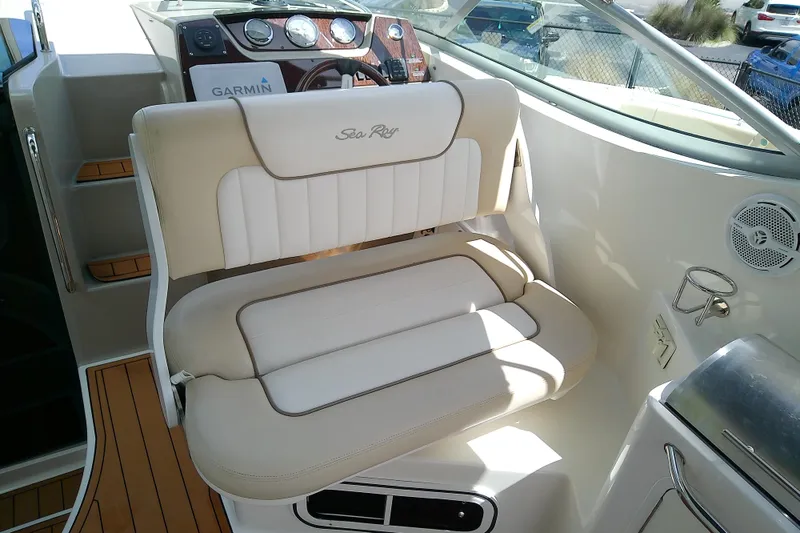 Slide: The Image of Captain's seat on 2012 Sea Ray Sundancer 280 boat, featuring Garmin navigation system. - 17