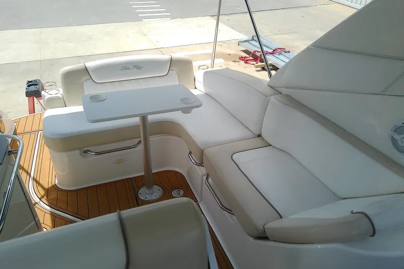 Slide: The Image of Luxurious seating area on a 2012 Sea Ray Sundancer 280 yacht with elegant white upholstery. - 15