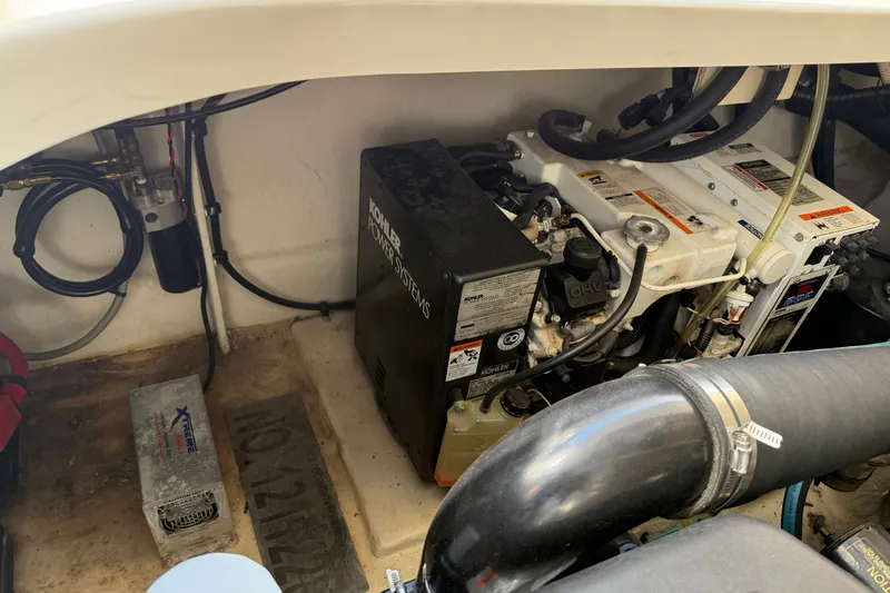 Slide: The Image of Engine compartment of a 2008 Sea Ray Sundancer 350 with Kohler power systems. - 38