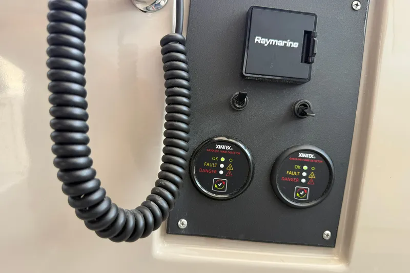 Slide: The Image of Control panel on a 2008 Sea Ray Sundancer 350 with Raymarine and Xintex detectors. - 20