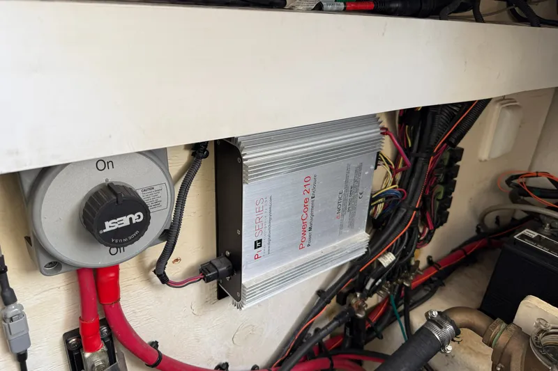 Slide: The Image of Electrical components in a 2008 Sea Ray Sundancer 350 boat engine compartment. - 43