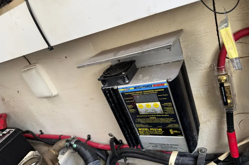 Slide: The Image of Marine converter charger in a 2008 Sea Ray Sundancer 350 engine compartment. - 42