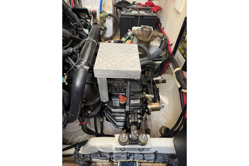 Slide: The Image of Engine compartment of a 2008 Sea Ray Sundancer 350 boat, showcasing mechanical components. - 40