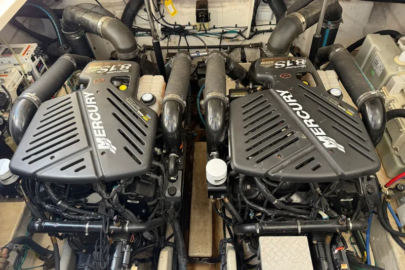 Slide: The Image of Twin Mercury engines in a 2008 Sea Ray Sundancer 350 boat engine room. - 36