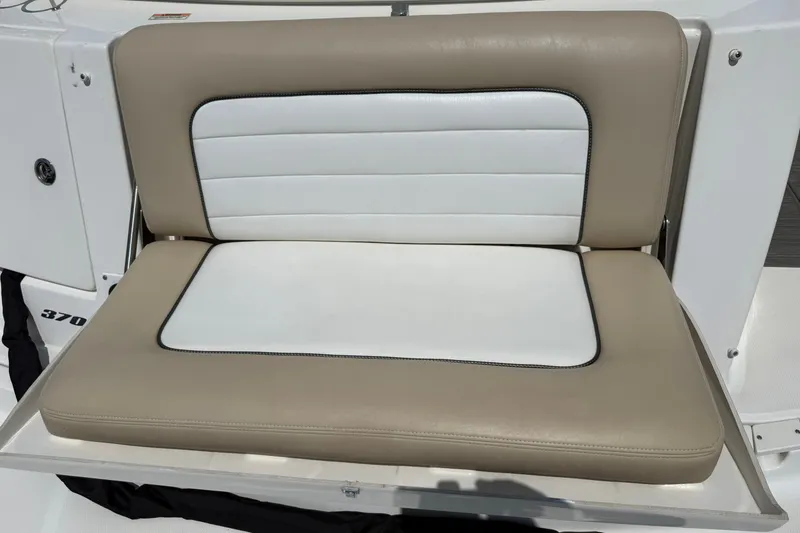 Slide: The Image of 2008 Sea Ray Sundancer 350 boat seat with beige and white upholstery. - 35
