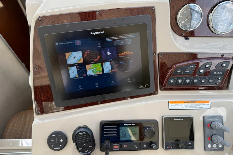 Slide: The Image of Control panel of a 2008 Sea Ray Sundancer 350 with Raymarine navigation system. - 17