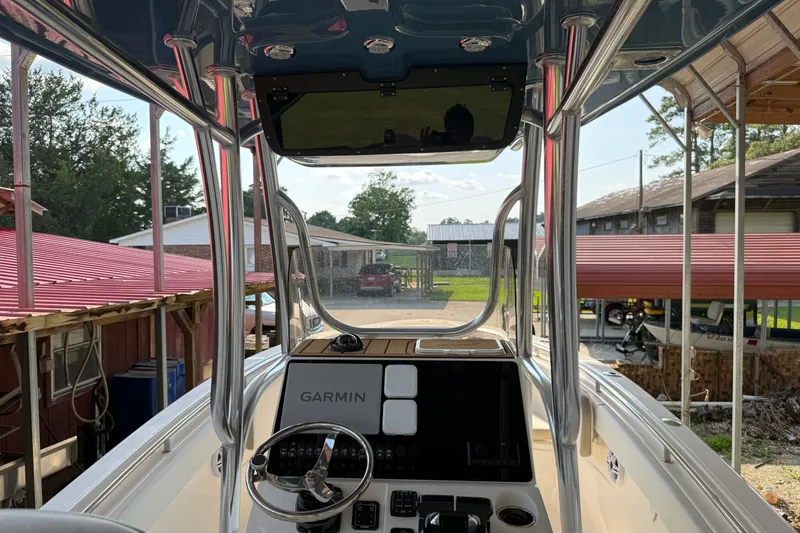 Slide: The Image of 2026 Bulls Bay 255 Center Console boat interior with Garmin navigation system. - 12