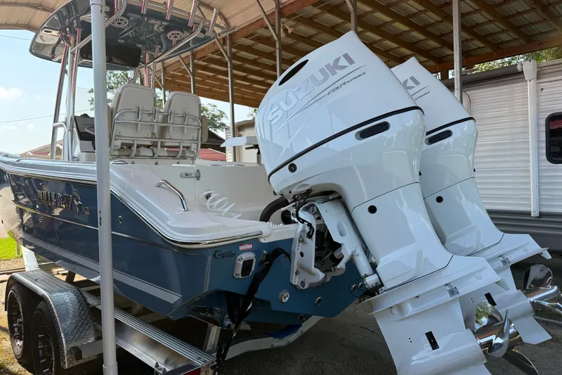 Slide: The Image of 2026 Bulls Bay 255 Center Console boat with twin Suzuki outboard motors. - 8