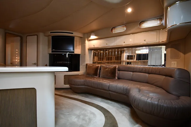 Slide: The Image of Luxurious interior of 1995 Sea Ray 630 Sundancer yacht with plush seating and modern amenities. - 50