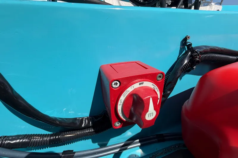 Slide: The Image of Red battery switch on a 1969 Boston Whaler 13 Super Sport boat. - 19