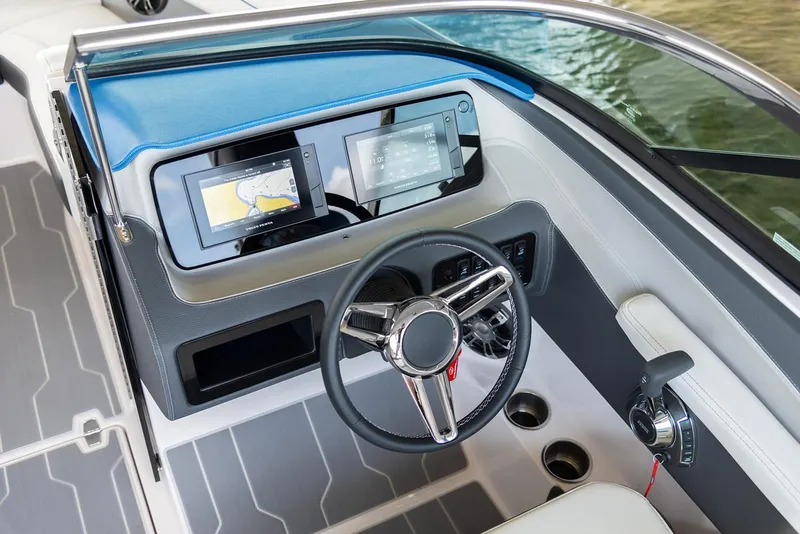 Slide: The Image of Manufacturer Provided Image: 2020 Regal LS6 Surf boat dashboard with modern controls and navigation screens. - 92