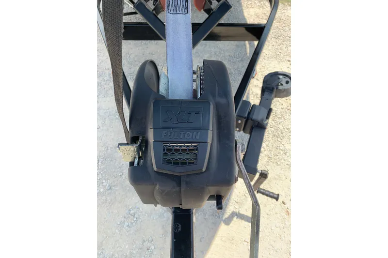 Slide: The Image of Fulton XLT winch on a 2020 Regal LS6 Surf trailer, gravel background. - 81