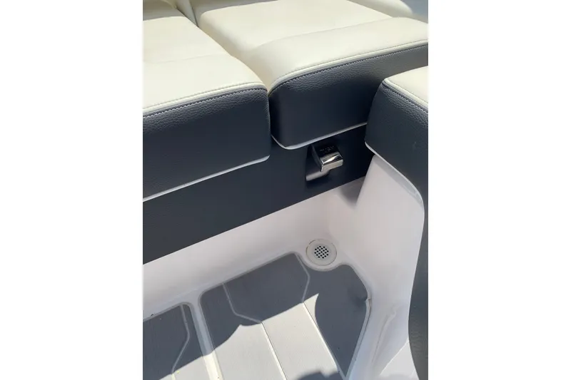 Slide: The Image of Interior seating detail of 2020 Regal LS6 Surf boat, featuring sleek upholstery and flooring. - 38