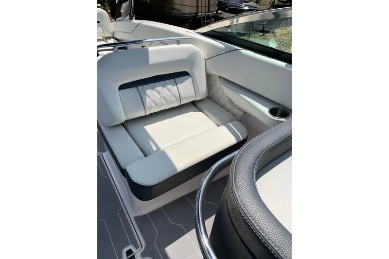 Slide: The Image of Luxurious seating on 2020 Regal LS6 Surf boat, featuring elegant white upholstery. - 27