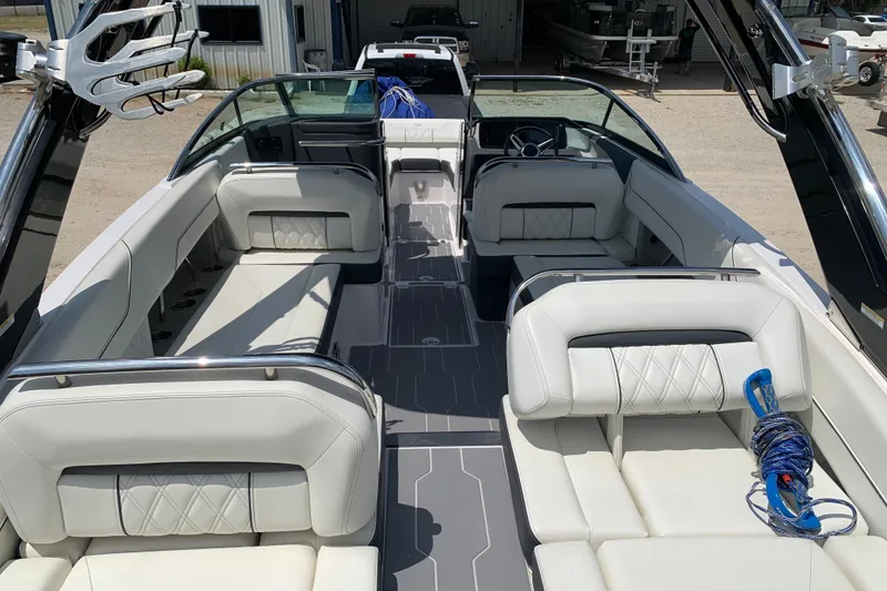 Slide: The Image of 2020 Regal LS6 Surf boat interior with luxurious seating and modern design. - 6