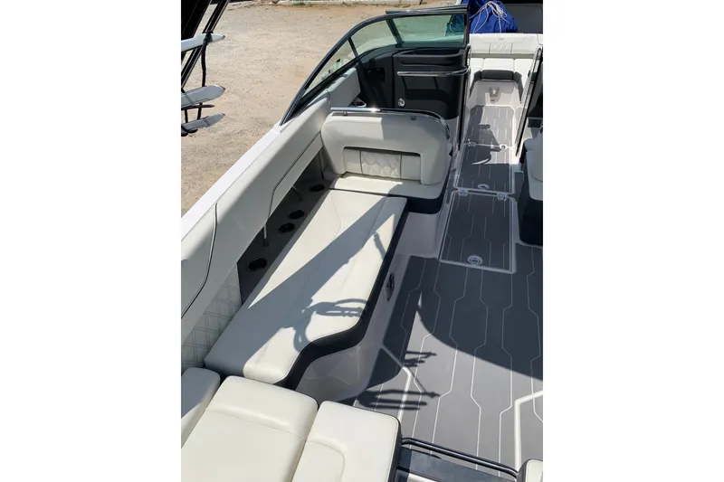 Slide: The Image of 2020 Regal LS6 Surf boat interior with sleek seating and modern design. - 15