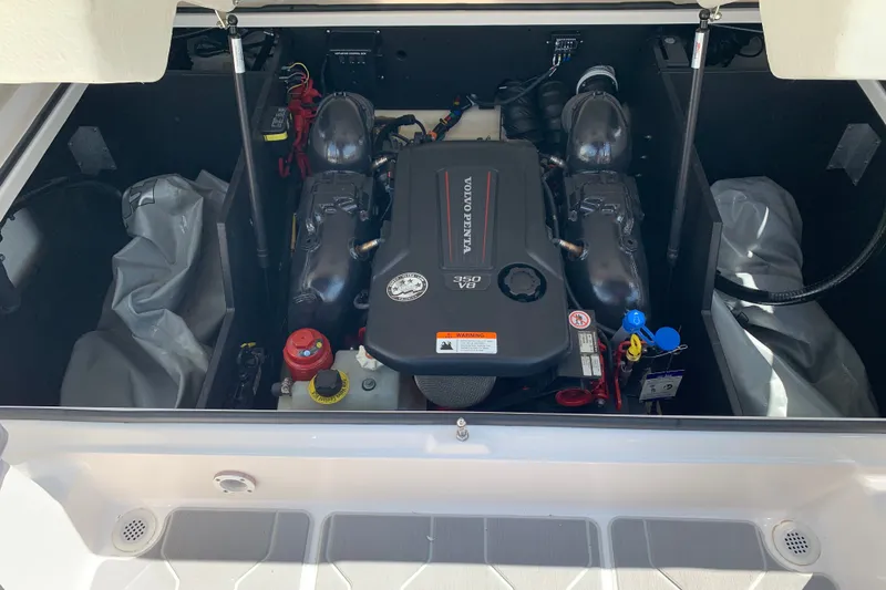 Slide: The Image of 2020 Regal LS6 Surf boat engine compartment with Volvo Penta 350 V8 engine. - 60