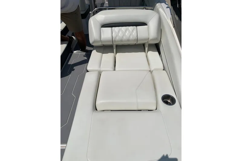 Slide: The Image of Luxurious seating on 2020 Regal LS6 Surf boat with cup holder. - 43