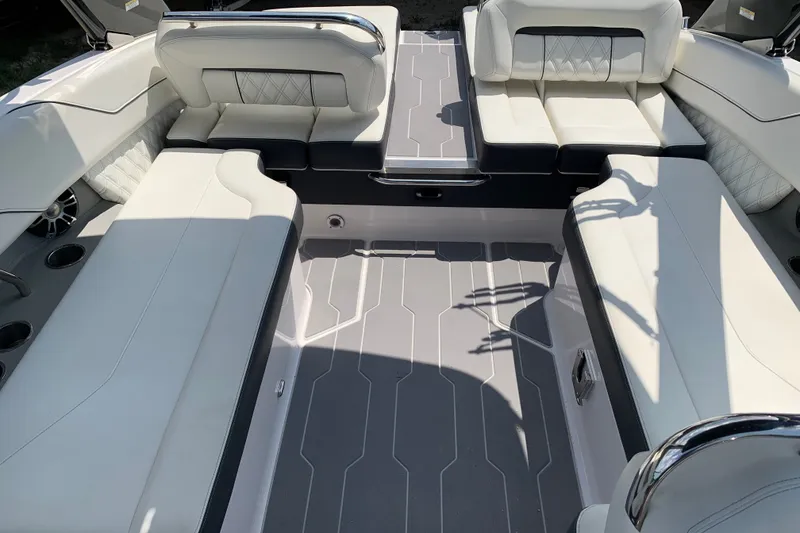 Slide: The Image of Luxurious interior of 2020 Regal LS6 Surf boat with white seating and modern design. - 13