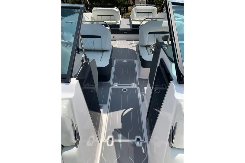 Slide: The Image of 2020 Regal LS6 Surf boat interior with sleek seating and modern design. - 23