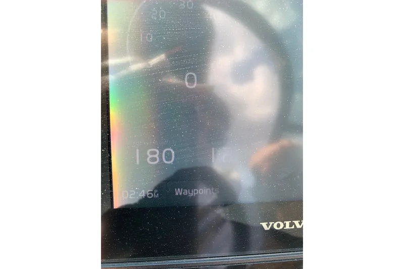 Slide: The Image of Dashboard display of a 2020 Regal LS6 Surf boat showing 180 units and waypoints. - 64