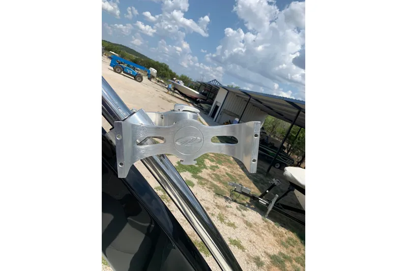 Slide: The Image of 2020 Regal LS6 Surf boat tower bracket under a partly cloudy sky. - 49