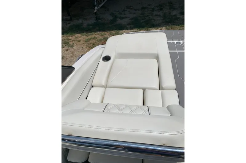Slide: The Image of Luxurious white seating on 2020 Regal LS6 Surf boat, featuring sleek design and comfort. - 39