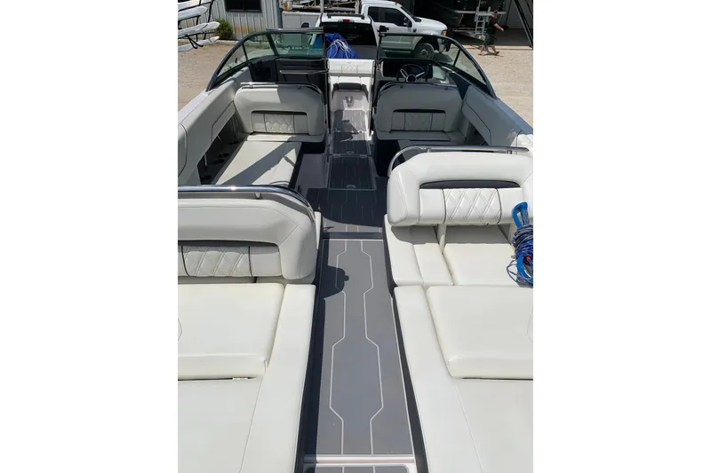 Slide: The Image of 2020 Regal LS6 Surf boat interior with luxurious seating and modern design. - 8
