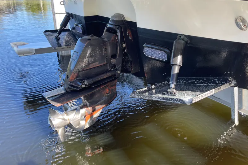 Slide: The Image of 2017 Monterey 295 Sport Yacht stern drive and propeller in water. - 27