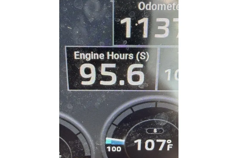 Slide: The Image of Dashboard display showing 95.6 engine hours on a 2023 Regal 29 OBX. - 10