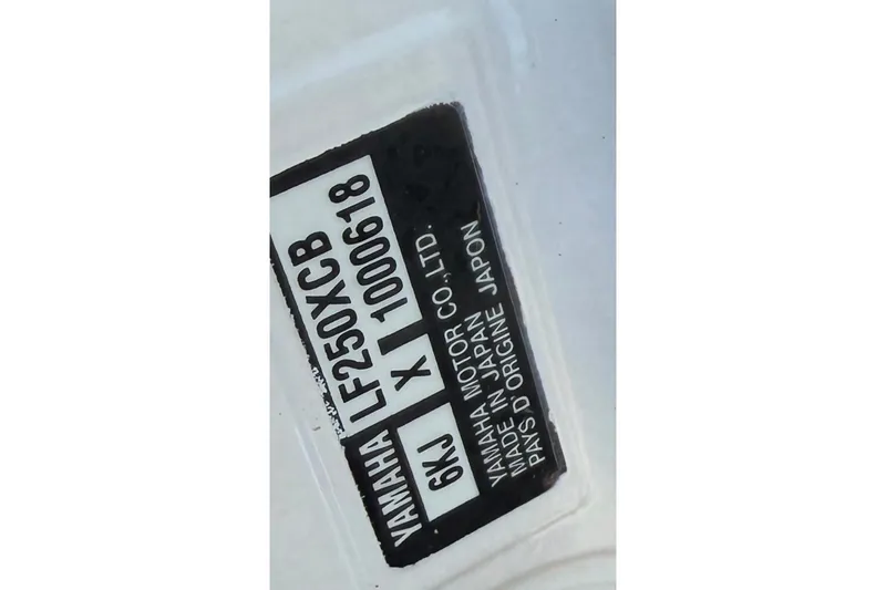 Slide: The Image of Label on Yamaha LF250XCB engine, made in Japan, on 2023 Regal 29 OBX boat. - 42