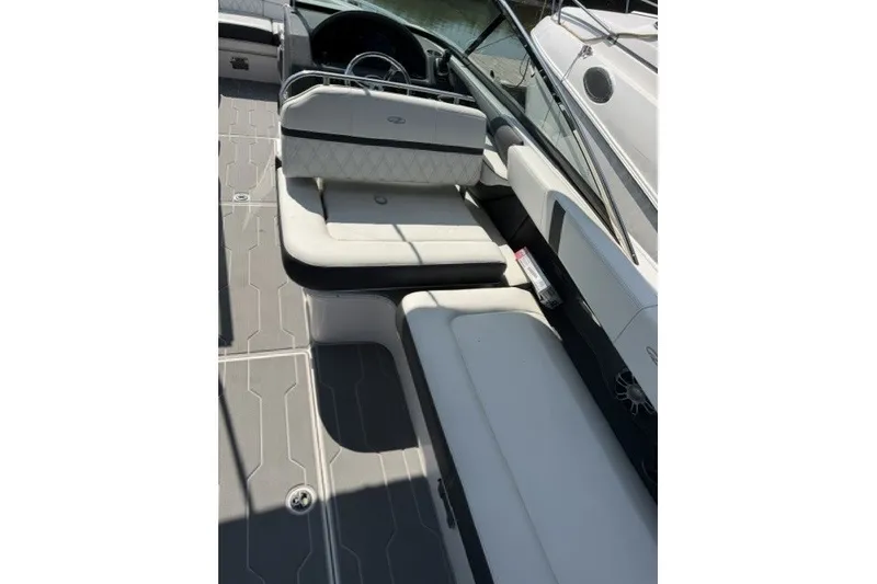 Slide: The Image of 2023 Regal 29 OBX boat interior with luxurious seating and modern design. - 29