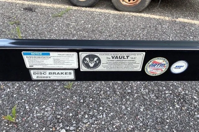 Slide: The Image of Trailer hitch with various labels, including disc brakes and lubrication system, on a 2009 Baja 24 H2X Boss. - 42