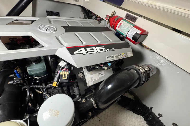 Slide: The Image of Engine compartment of a 2009 Baja 24 H2X Boss with 496 MAG engine. - 32