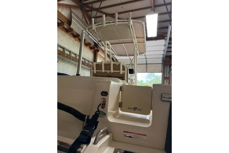 Slide: The Image of 2020 Scout 215 XSF boat interior in a garage setting. - 18